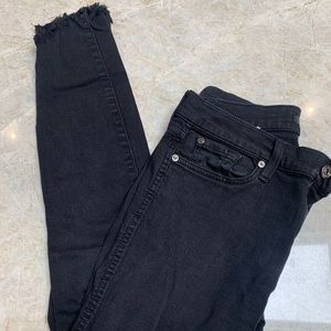 7 for All Mankind black skinny jeans w/ chewed hem